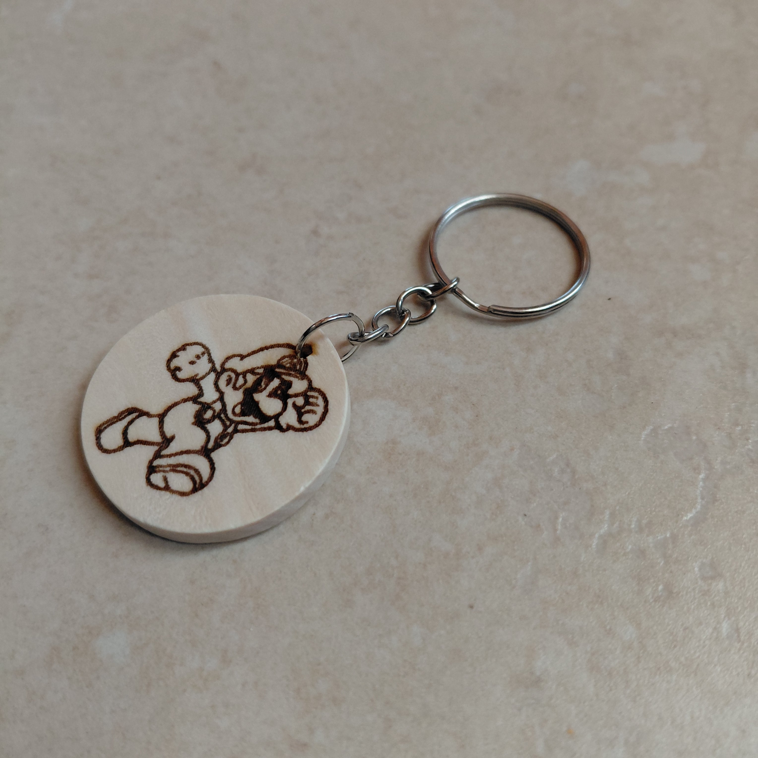 Llavero de madera grabado láser Super Mario