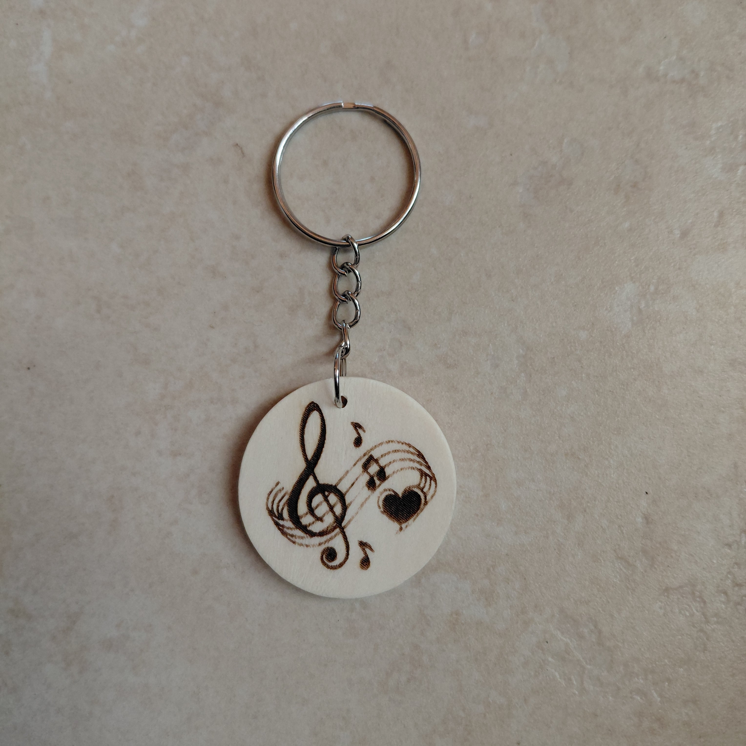 Llavero de madera grabado láser Música