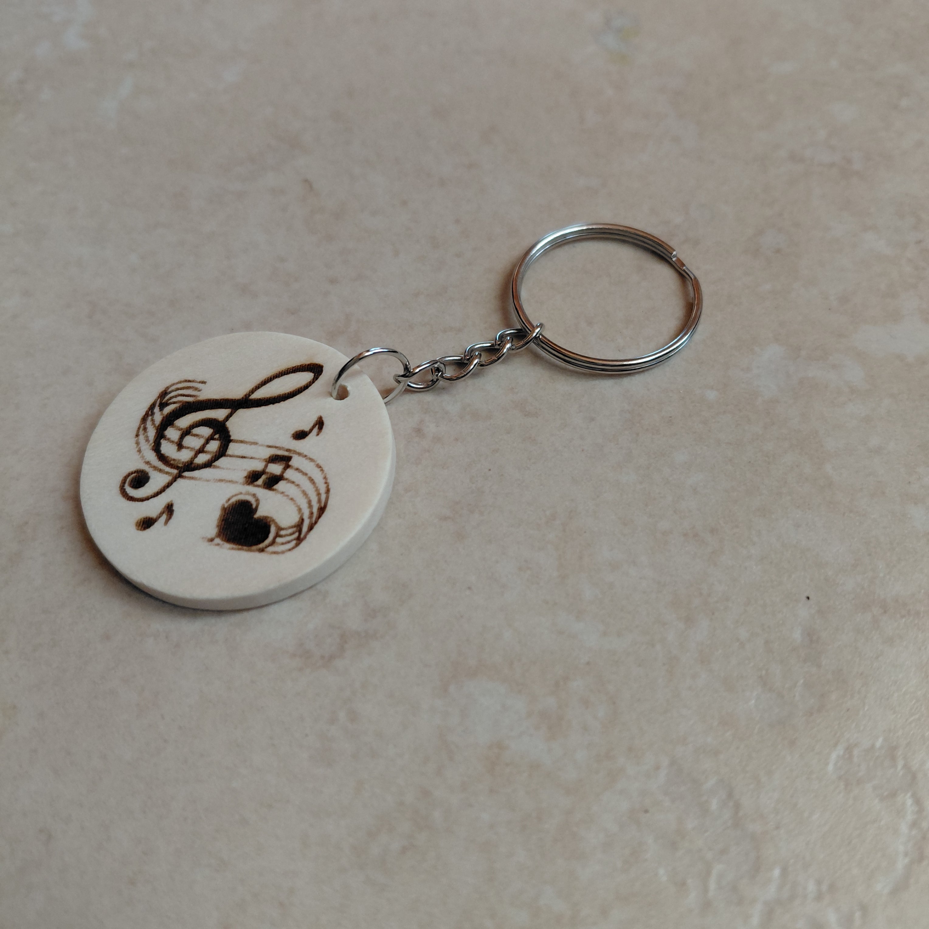 Llavero de madera grabado láser Música