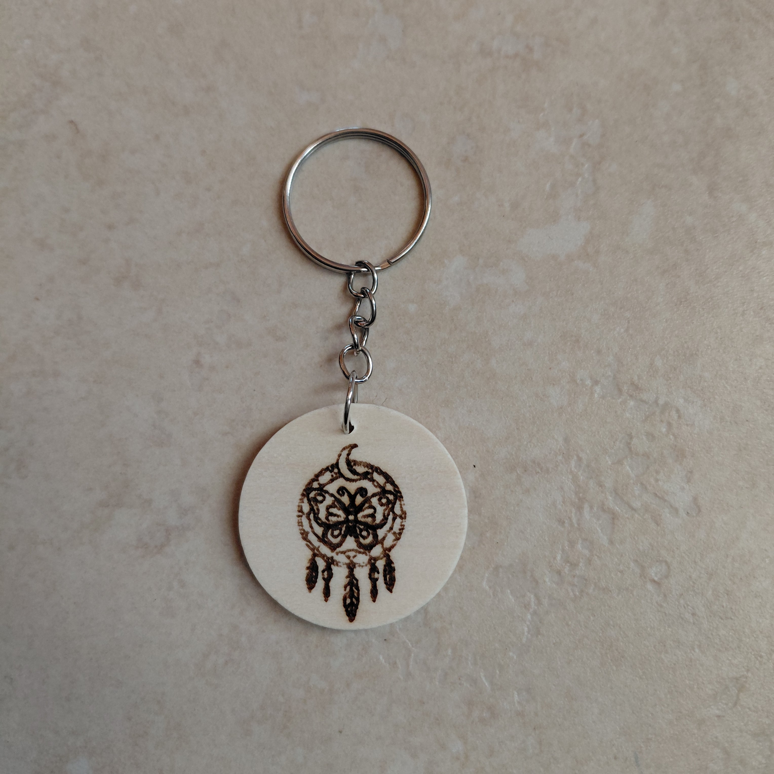 Llavero de madera grabado laser Atrapasueños con mariposa