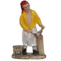 Pescatero limpiando pescado (9 cm) ideal para tu belén navideño.