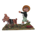 Plataforma niño con perro estilo moderno (8 cm) ideal para tu belén navideño.